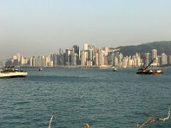06A Quarry Bay and Causeway Bay buildings across Victoria Harbour from Star Ferry Tsim Sha Tsui pier Hong Kong